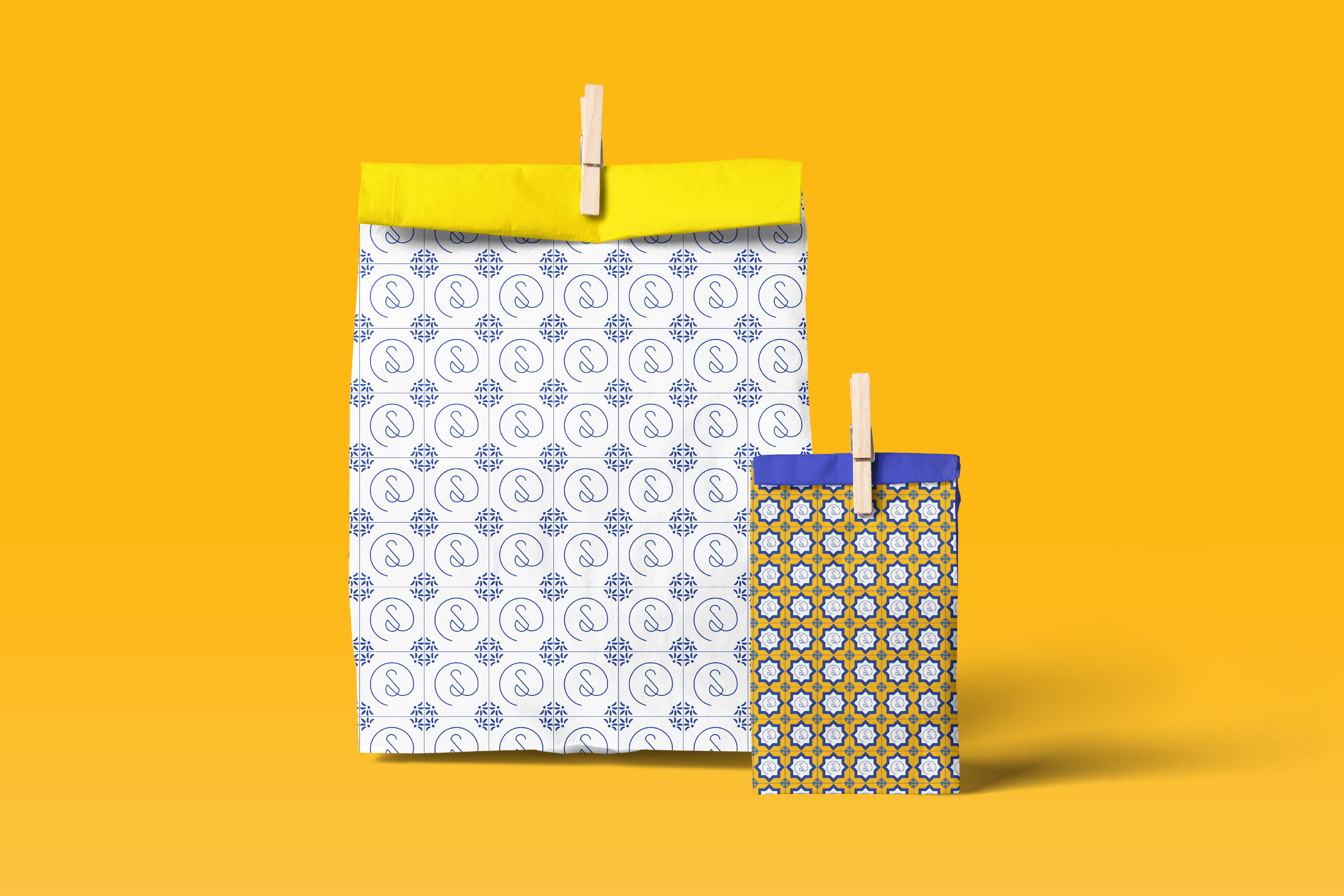 An image of mockups of my final pattern designs against a yellow background